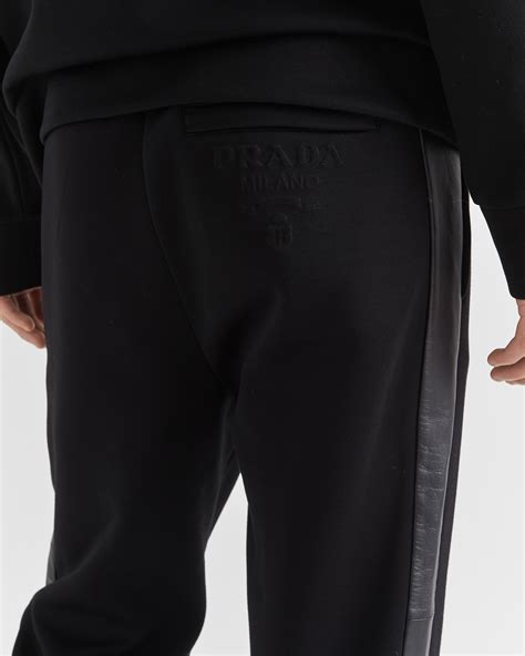 pantaloni in pelle prada|Pantaloni in felpa tecnica e pelle Nero .